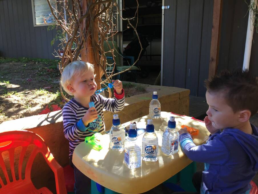 Louis Kane and friend Jaxyn Opie enjoyed the bubbles.  Photo: Supplied