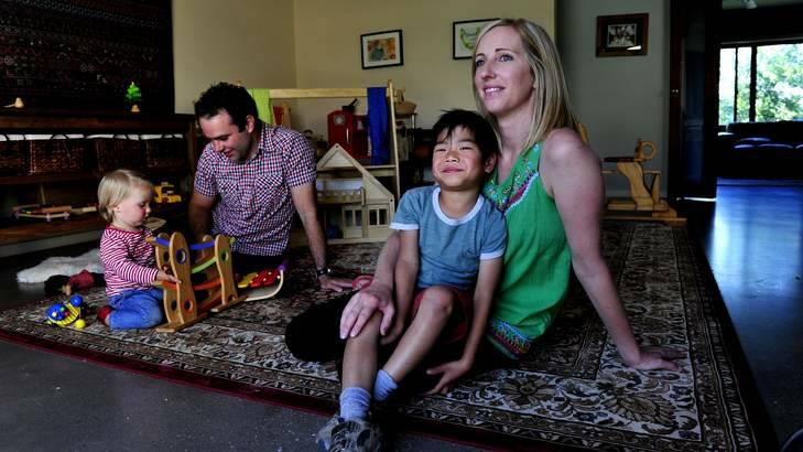 Bronwyn and Andrew Lucey with their children Molly, 15 months, and Kai, 5, who was adopted from a Thai orphanage. Photo: Melissa Adams