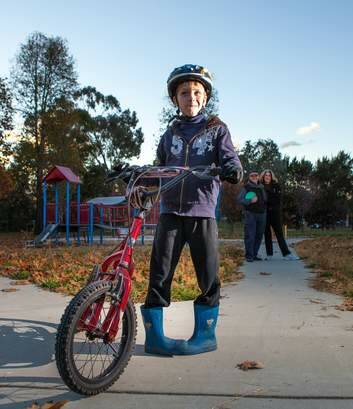 Zac Kendall, 8, gets some play time outside. Photo: Katherine Griffiths