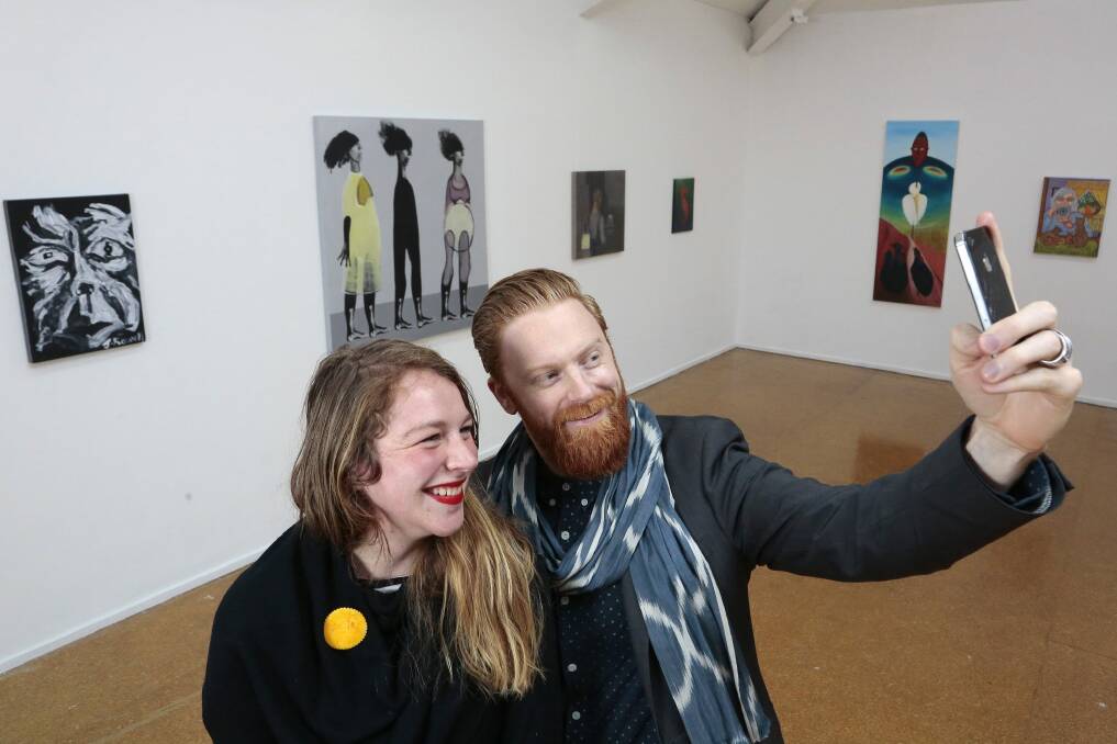 Alexander Boynes and Sabrina Baker get into the selfie spirit. Photo: Jeffrey Chan
