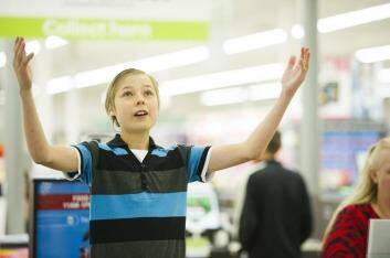 Up in the air: Kieran Larkin auditions for Mary Poppins at Majura Park shopping complex. Photo: Jay Cronan