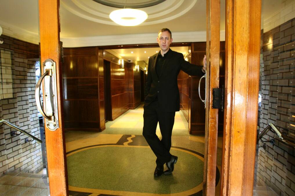 100910 SMH Domain Photo Steven Siewert. Tony Grybowski in the foyer of the Wroxton Apartment building in Elizabeth Bay/ Rushcutters Bay that was originally covered on carpet over the floors and walls. The wood paneling and Terrazzo floors have been restored. SPECIAL SS100910 Photo: Steven Siewert