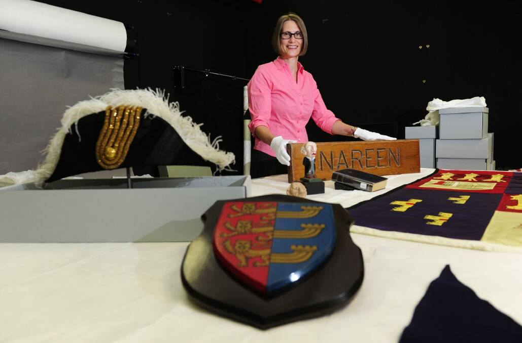 Museum of Australian Democracy content development manager Kate Armstrong with some of the quirky items belonging to politicians now in the collection at Old Parliament House. Photo: Melissa Adams