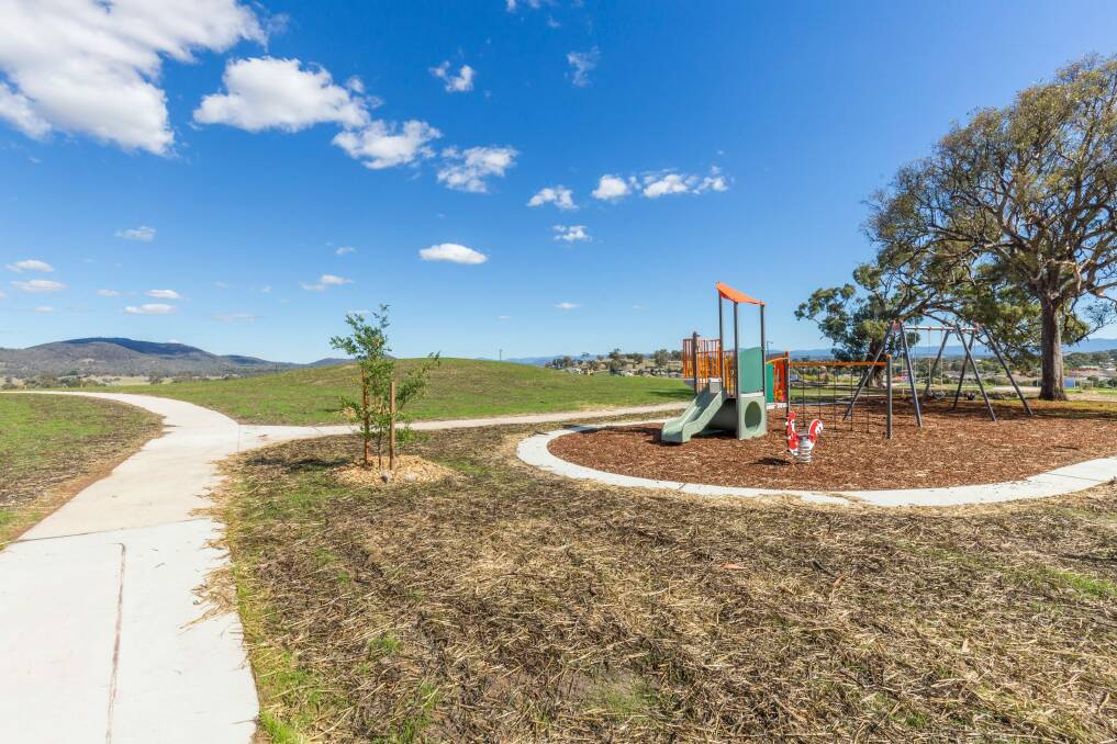 The Throsby premium blocks are located next to parkland, including a playground.