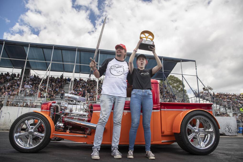 Rick Werner from the Gold Coast celebrates with his daughter Danielle after his 1932 Ford pickup hotrod was named the 2019 Summernats Grand Champion Photo: Sitthixay Ditthavong