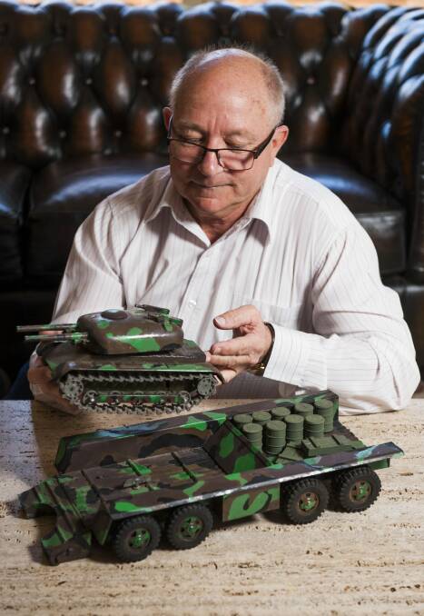Don Gray with the restored model tank and fuel transporter designed by his father, which featured in The Canberra Times almost 50 years ago,  Photo: Elesa Kurtz