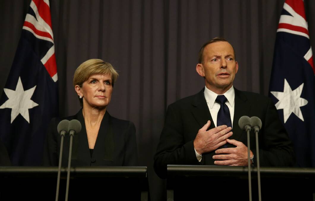 Foreign Affairs Minister Julie Bishop and Prime Minister Tony Abbott address the media after the executions of Andrew Chan and Myuran Sukumaran.  Photo: Alex Ellinghausen