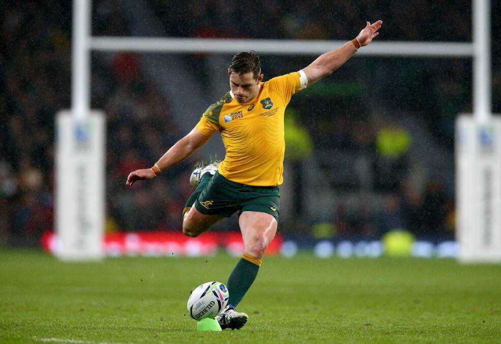 Ice cool: Bernard Foley kicks the winning penalty during the quarter-final against Scotland. Photo: Getty Images