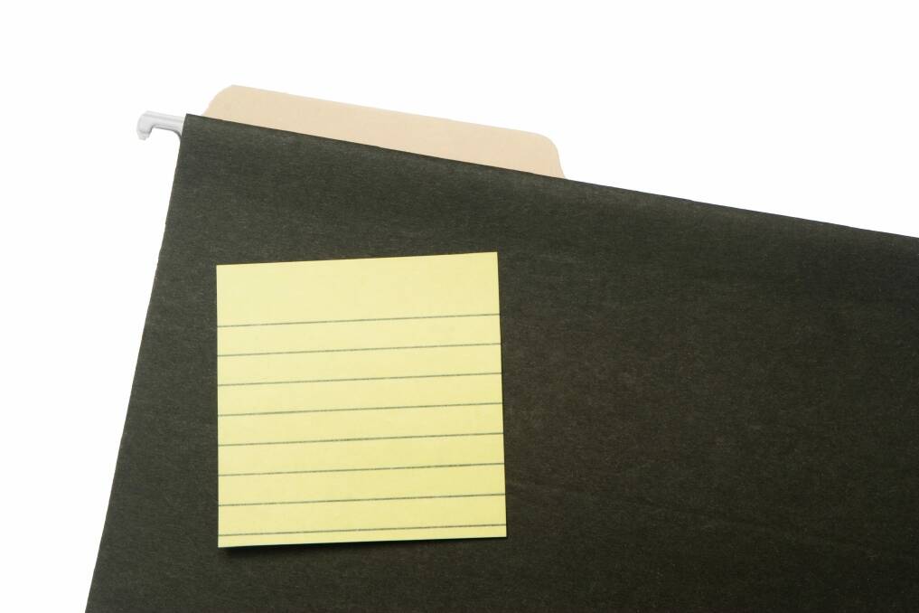 Post-it notes can fall off files. Photo: iStock Photos