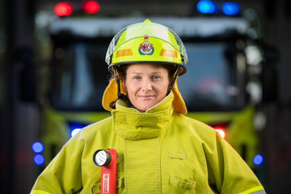 Merrin Starr of the Brumbies women on duty at her 'day job' as an ACT firefighter at Ainslie Fire Station. Photo: Stuart Walmsley