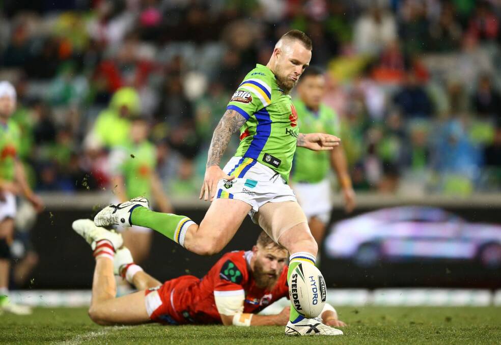 Raiders half Blake Austin attempts a field goal against the Dragons Photo: Getty Images
