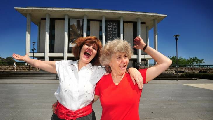 Canberra singers Glenda Cloughey of Griffith and Johanna McBride of Farrer will be singing in the National Library in one of the 365 musical concerts organised in public places to celebrate the centenary year. Photo: Karleen Minney