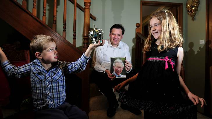 Garth Leggart with his children, Alexander, 4 and a half, and Ingrid, 7, are looking forward to seeing the Prince of Wales Prince Charles and The Duchess of Cornwall Camilla Parker-Bowles when they visit Canberra. Photo: Melissa Adams