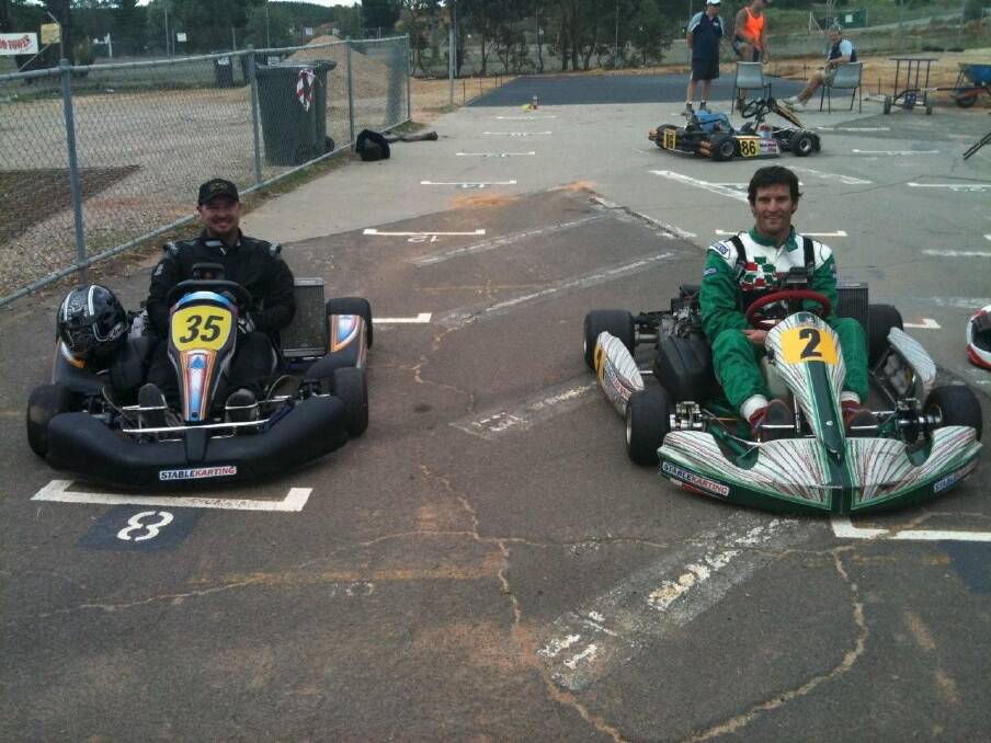 Mark Webber, right, with Australian Masters Rotax DD2 kart champion Tony Prendergast at a Canberra karting track.