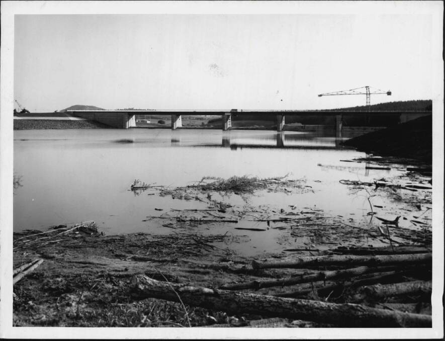Engineers warned about the possibility of the lake becoming a 'windswept marsh'. This picture was taken in 1963 soon after the Molonglo River was dammed. Photo: Fairfax Media