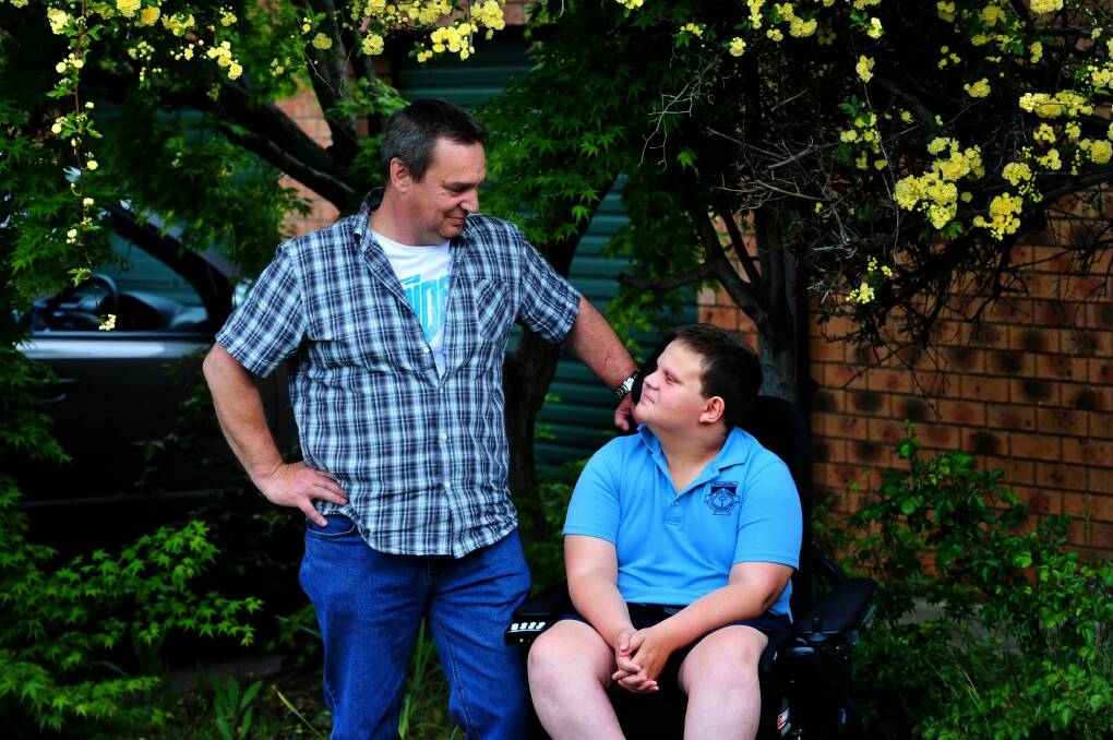 Mark Brookhouse of Macarthur and his son Connor,12  have been on the ACT housing priority list since February 2013. Photo: Melissa Adams