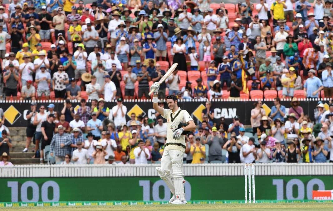 Warm reception: Kurtis Patterson celebrates his maiden Test century in his second Test match. Photo: AAP