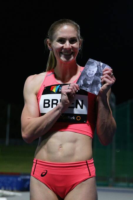 Melissa Breen wins the 100 metres national title on Saturday night with Hunter Reid the inspiration pinned to her bib. Photo: Cameron Spencer