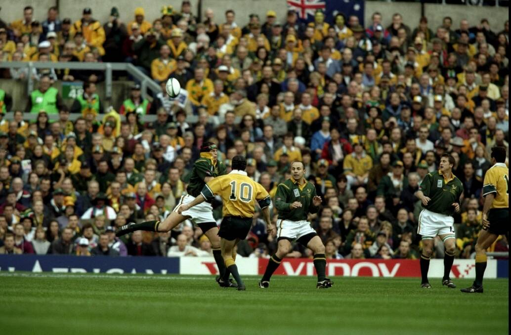 The moment:  Stephen Larkham kicks the winning field goal for Australia in the 1999 Rugby World Cup semi final. Photo: Gary M. Prior/Allsport 
