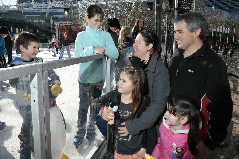 The Blackmore family of Murrumbateman. Kaiden, 5, Taliah, 10, Brianna, 8, and Makayla, 6, with parents Anne and Marc at Skate in the City during Diabetes ACT Jelly Bean Picnic on Ice.   Photo: Jeffrey Chan