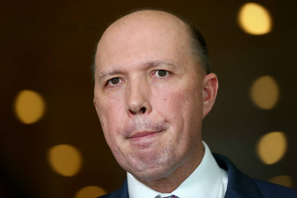Peter Dutton says the amendments aim to clarify the laws so that they "reflect the original policy intent". Photo: Alex Ellinghausen
