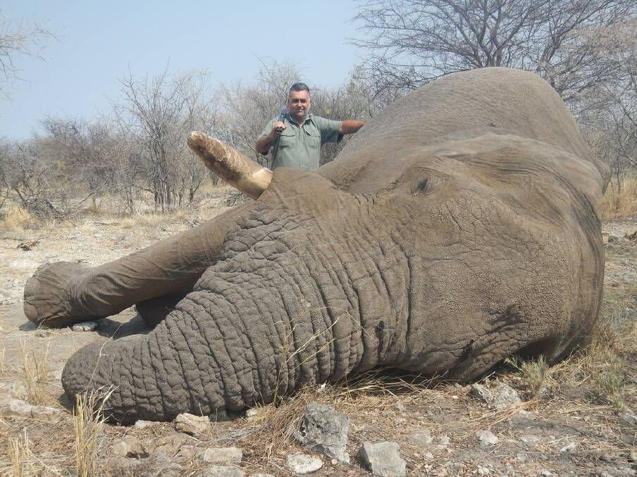 Nick Haridemos with an elephant bull he shot and killed. Photo: Supplied