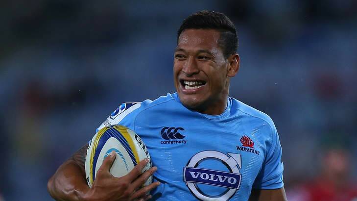 Israel Folau of the Waratahs beats the defence to score a try during the round three Super Rugby match between the Waratahs and the Reds. Photo: Joosep Martinson