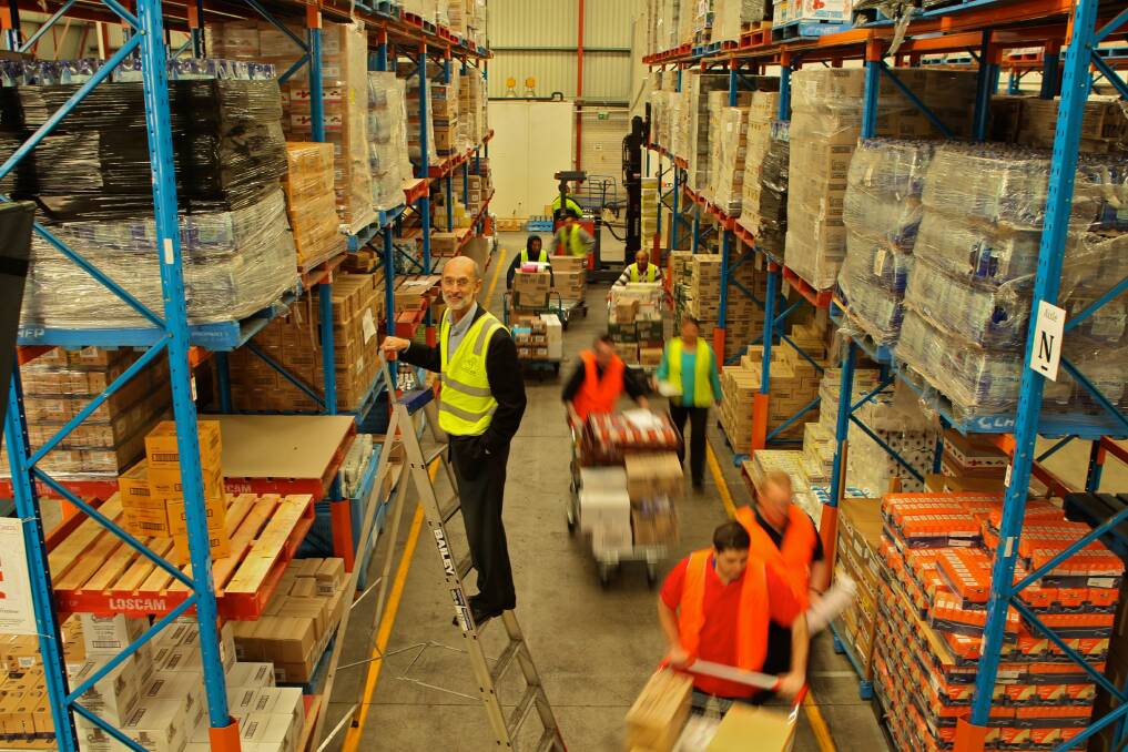 Foodbank's warehouse in Sydney. Each year, Foodbank distributes more than 35 million kilograms of food and groceries to those in need. Photo:  Marco Del Grande
