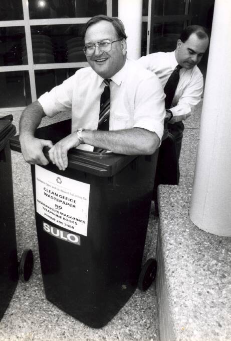 Liberal MLAs Bill Stefaniak and Tony De Domenico demonstrated their party's support for big bins. Photo: Graham Tidy