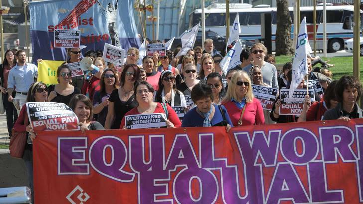 There are battles for women that are still worth fighting... community workers rally for equal pay in Civic last year. Photo: Graham Tidy