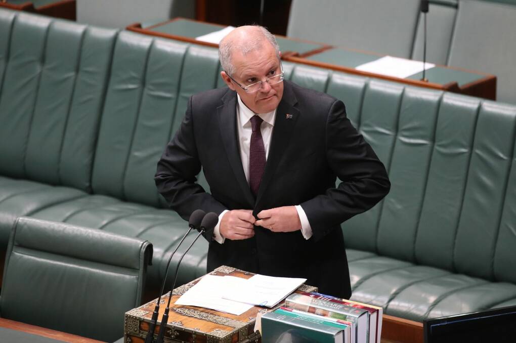 Treasurer Scott Morrison has flagged "risks to the growth story''.  Photo: Andrew Meares