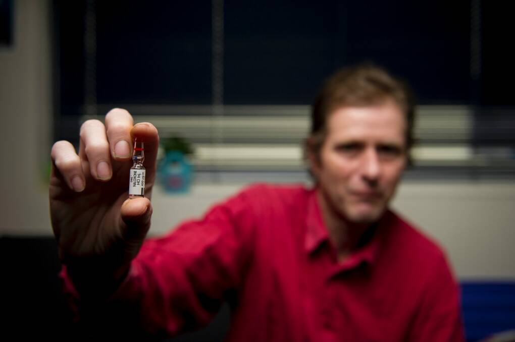 Naloxone trainer David Baxter with a "take home" naloxone injecting pack that could save lives in the case of an overdose. Photo: Jay Cronan