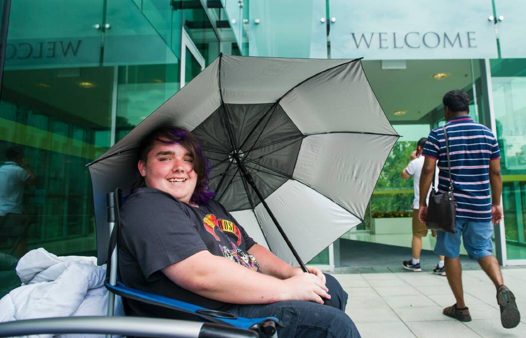 Luke Marshall 16 of Belconnen is first in line at the Royal Australian Mint to get the first coin of 2017. Photo: Elesa Kurtz