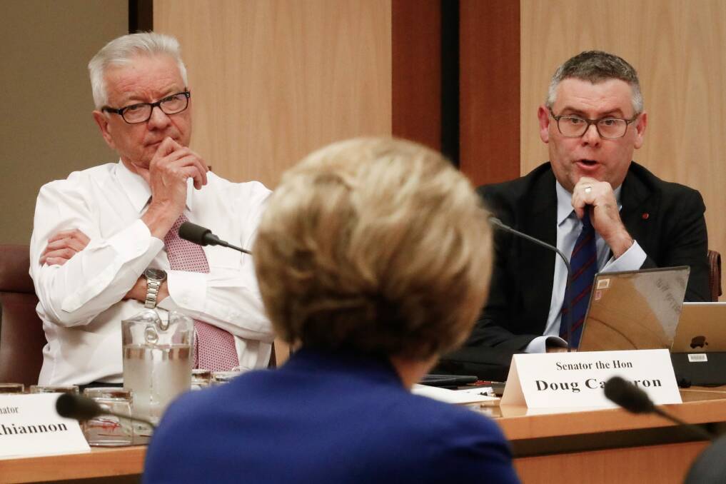 Senators Murray Watt and Doug Cameron put questions to Employment Minister Michaelia Cash during a Senate estimates hearing at Parliament House in Canberra on Wednesday. Photo: Alex Ellinghausen