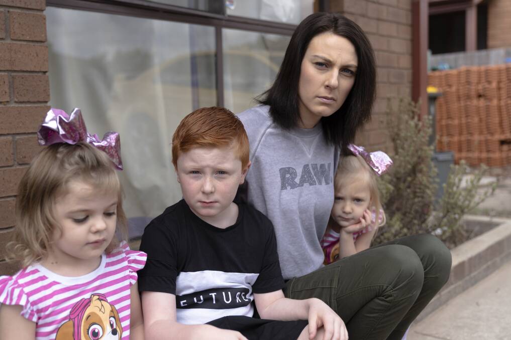 Melissa says her three children 
 Ivy, 3, Travis, 8 and Kenley 3, have also suffered symptoms brought on by mould since living at their Gilmore address. Photo: Lawrence Atkin
