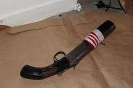 The sawn-off shotgun that was found in a Ngunnawal home, in an image provided by police. Photo: Supplied