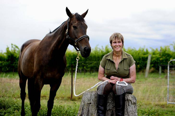 Niki van Buren is preparing for the world para equestrian championships this year. Pic taken at Pine Ridge, Holt with Niki's horse, Darcy, 8. Photo: Melissa Adams