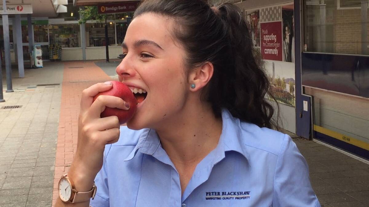 Emily Kelly bought an apple for lunch most days and said she was attracted to natural-looking fruit.  Photo: Steven Trask