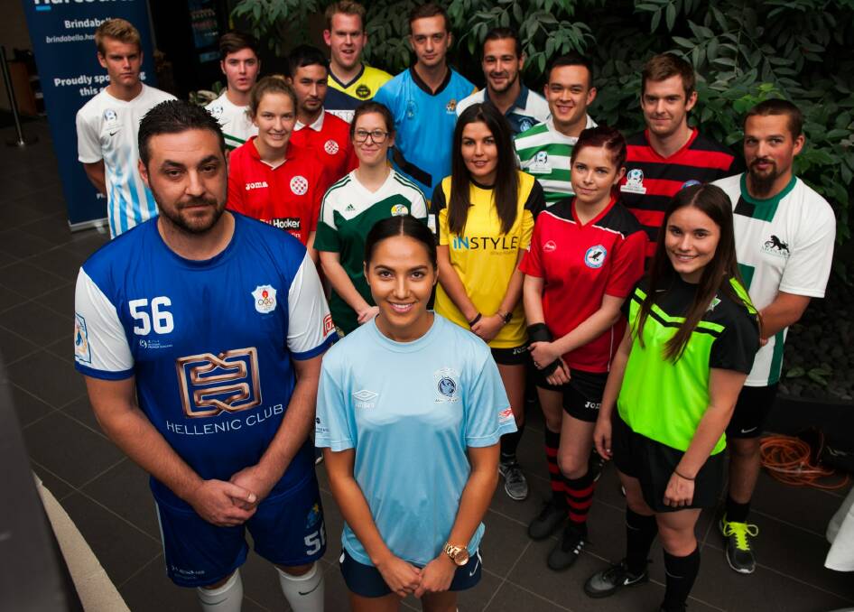 Last year's grand final winners, Angelo Konstantinou from Canberra Olympic, and Belconnen United's Nicole Jalocha, with representatives from the other premier league teams. Photo: Elesa Kurtz