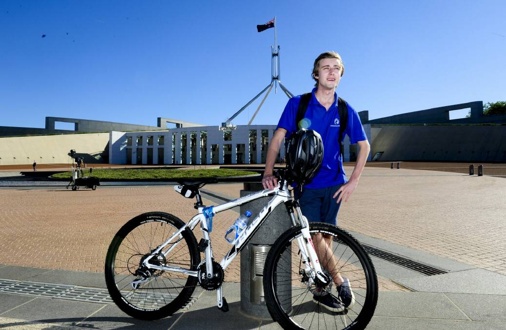 Stroke survivor Luke Webb of Sydney, rode his pushbike from Goulburn to Parliament House. Photo: Melissa Adams