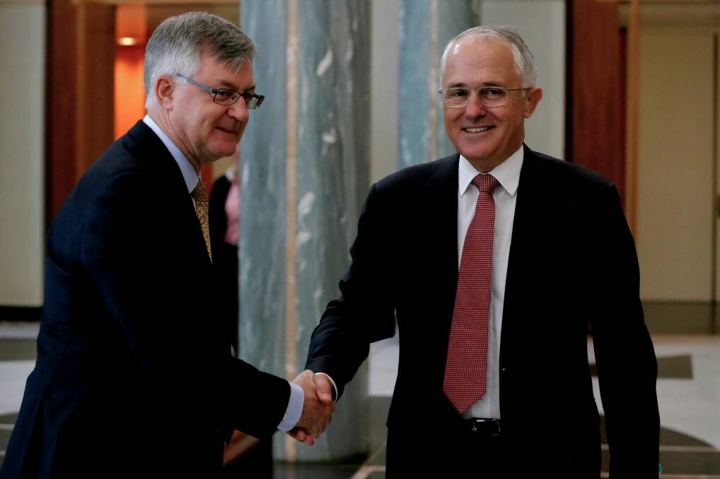 Department of Prime Minister and Cabinet secretary Dr Martin Parkinson, left, announced the review Photo: Alex Ellinghausen