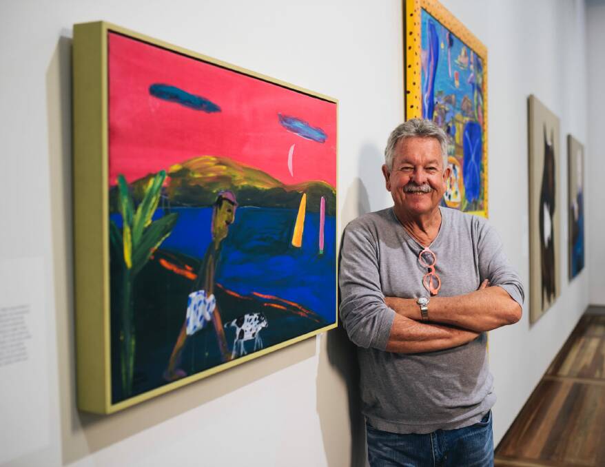 Artist Ken Done with some of his works. Photo: Rohan Thomson