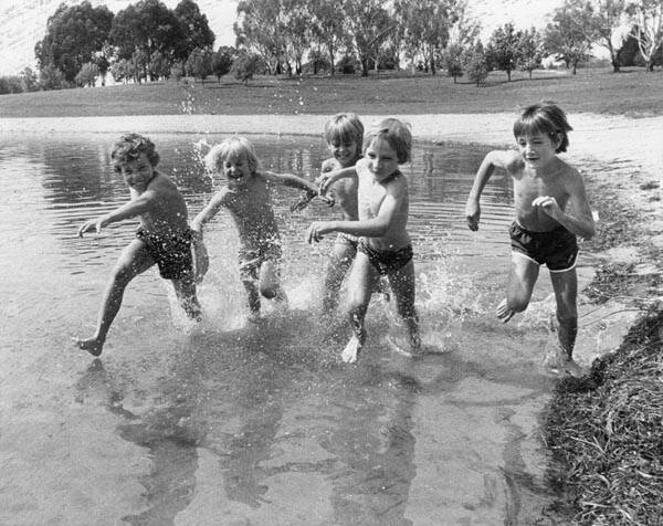 Members from the City branch and Corroboree Park section of the YMCA rush into the Lake Burley Griffin at Weston Park in 1978. Anton Radovanovic, 7, left, of Melba, David O'Connell, 8, of Fraser, Scott Maclean, 8, of Duffy, Gareth Adcock, 8, of Higgins and John Patrick, 6, of Giralang Photo: Jim Green