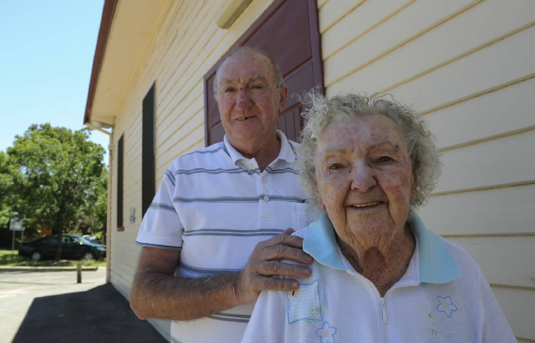 Causeway resident 89-year-old Audrey Griffiths who has lived her whole life in the tiny suburb, pictured with her son, Robert.  Photo: Graham Tidy