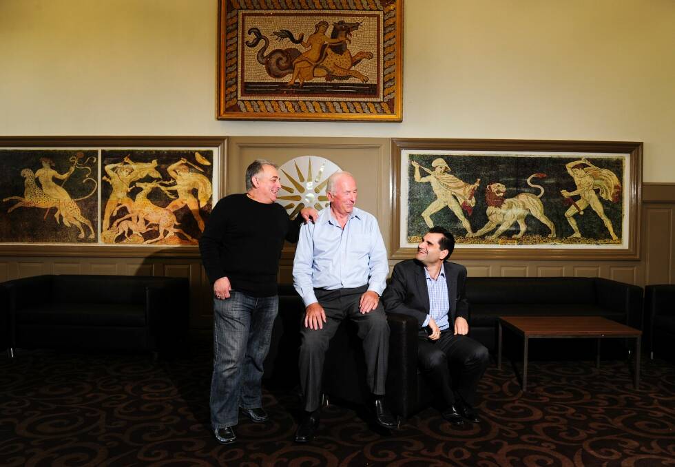 Right, John Kalokerinos, president of the Hellenic Club in Woden, with foundation members from left, Michael George and Alex Diamond. Photo: Melissa Adams
