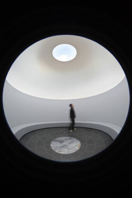 James Turrell 
Within without 2010 
Skyspace: lighting installation, concrete and basalt stupa, water, earth, landscaping. Photo: John Gollings
