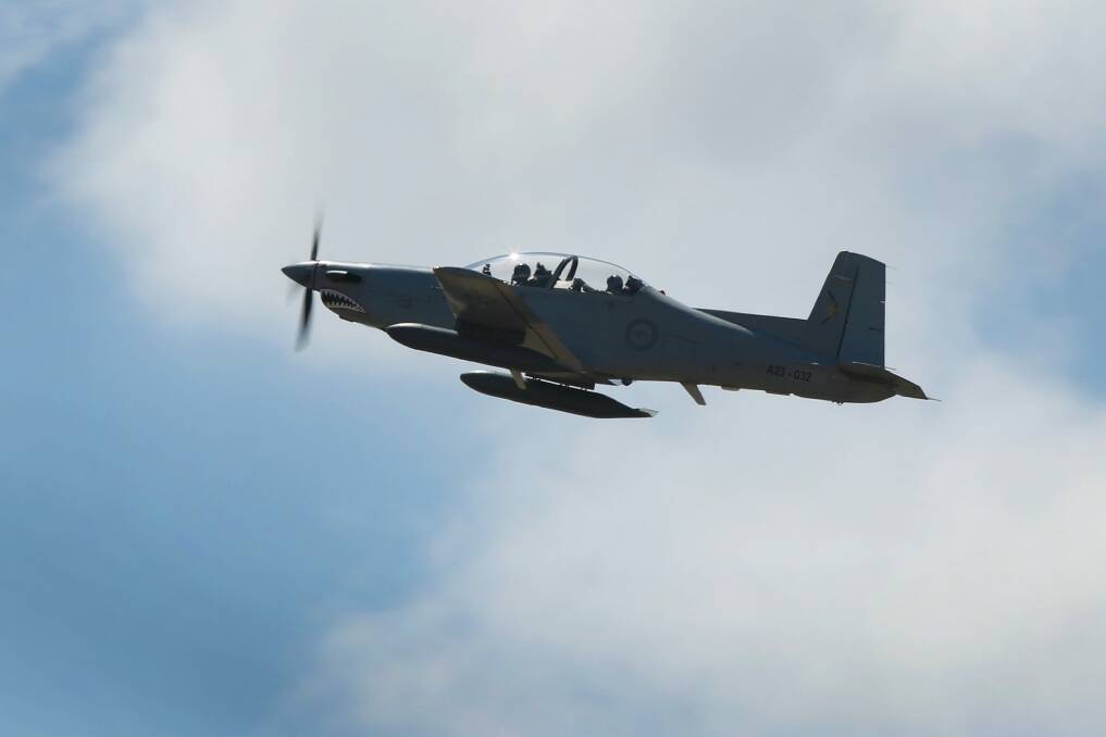 A No 4 Squadron PC-9 takes off from a RAAF base. Photo: CPL Craig Barrett