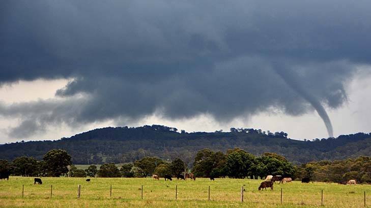 ''It's very rare": A dramatic tornado hit the skies above the small Northern Tablelands village of Ben Lomond. Photo: Michael Bath and Jason Paterson