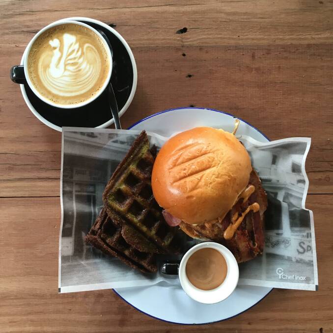 Free range bacon, eggs, prosciutto, provolone, Church BBQ, chipotle mayo on a soft bun, with a side of waffle hashbrowns. Photo: Supplied