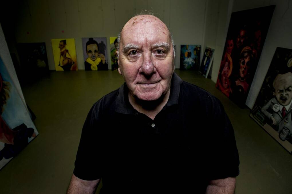Bald Archy creator Peter Batey with some of the entries to the satirical art award. Photo: Jay Cronan